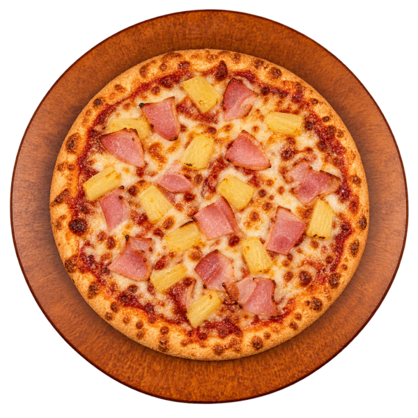 Small pizza topped with ham and pineapple on a wooden board
